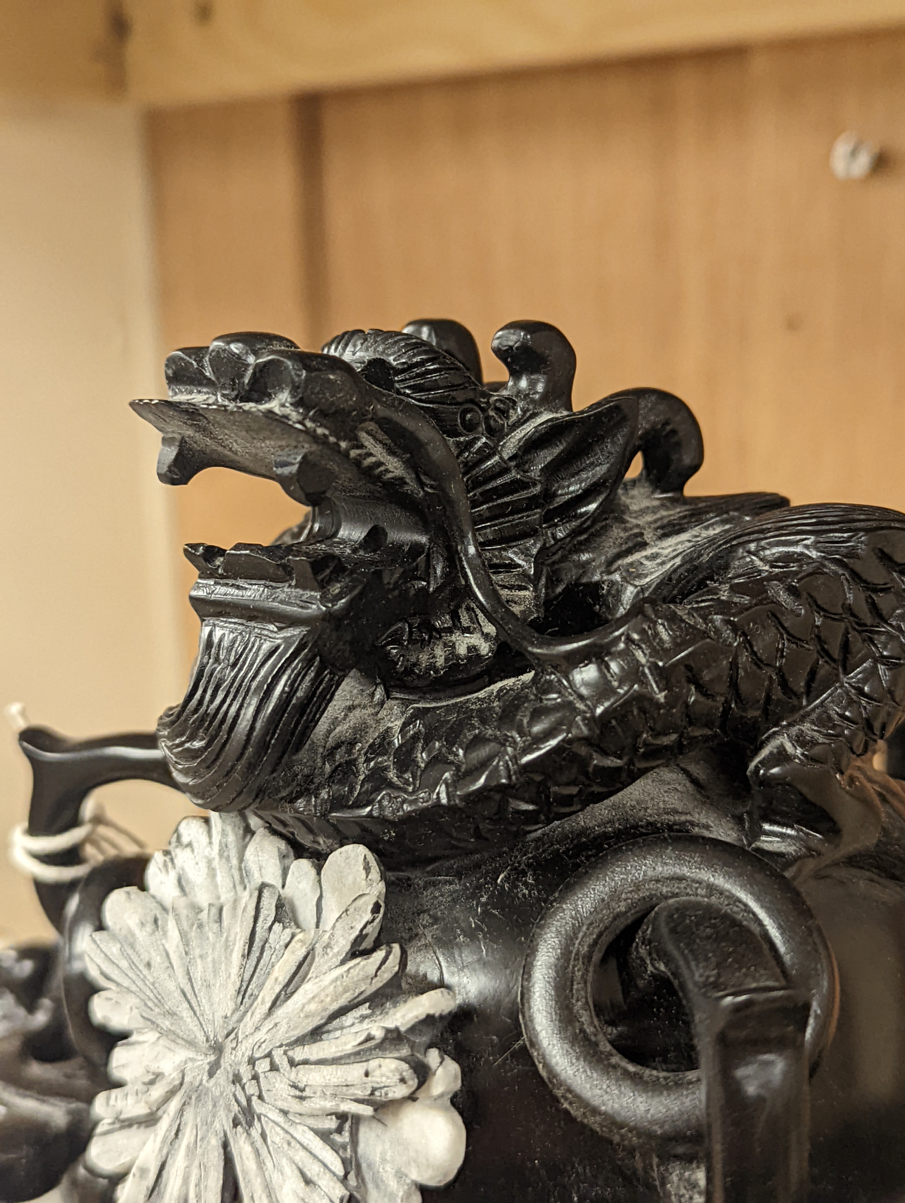 A large decorative Chinese black hardstone tripod censer and cover - 25.5cm high
